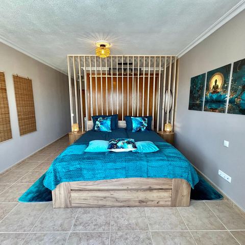 Dormitorio turquesa